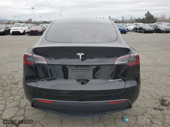 2025 Tesla Model Y Long Range with VIN 7SAYGDEE6SF308226, listed as a Copart auction lot 48006865 with 2,291 mi miles and Salvage Title. Bid and sale history available at carsss.com. Image 6.