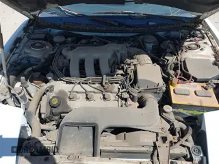1996 Ford Probe z VIN 1ZVLT22B0T5127219, wystawiony jako IAAI lot #42279311 z przebiegiem 123 290 mil mil oraz . Historia ofert i sprzedaży dostępna na DreamBid. Obrazek 10.