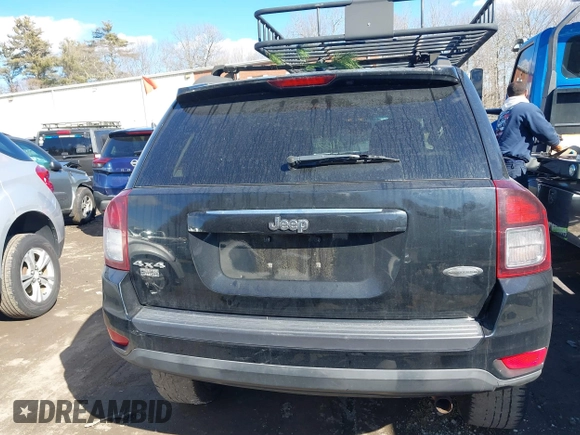 2014 Jeep Compass Latitude with VIN 1C4NJDEB2ED626380, listed as a IAAI auction lot 41675908 with 90,153 mi miles. Bid and sale history available at carsss.com. Image 17.