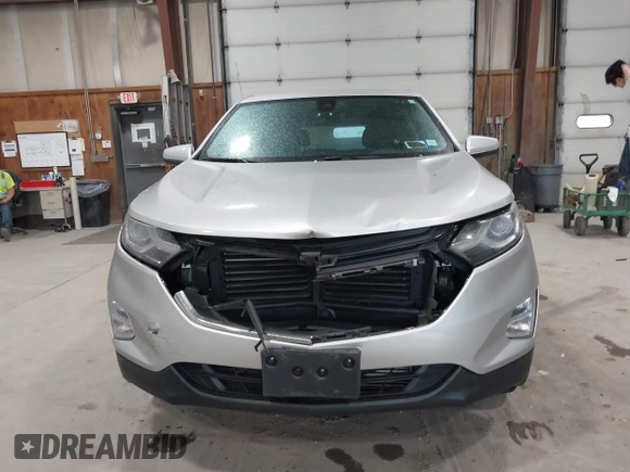 2021 Chevrolet Equinox LT z VIN 3GNAXUEV9MS140887, wystawiony jako IAAI lot #42246019 z przebiegiem 65 108 mil mil oraz . Historia ofert i sprzedaży dostępna na DreamBid. Obrazek 12.
