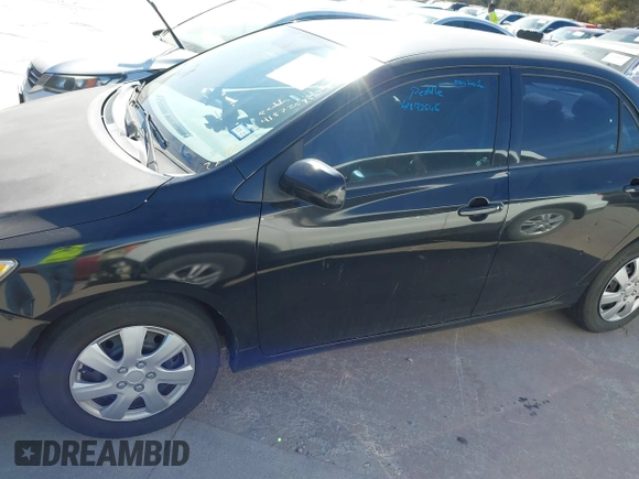 2012 Toyota Corolla L with VIN 5YFBU4EE8CP061390, listed as a IAAI auction lot 41872545 with 104,476 mi miles. Bid and sale history available at carsss.com. Image 14.