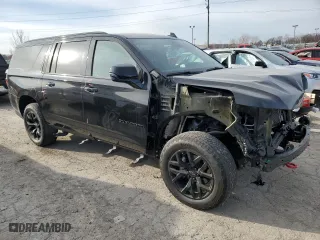 2022 Chevrolet Suburban Z71 with VIN 1GNSKDKD8NR103512, listed as a Copart auction lot 82299534 with 50,185 mi miles and Salvage Title. Bid and sale history available at carsss.com. Image 4.