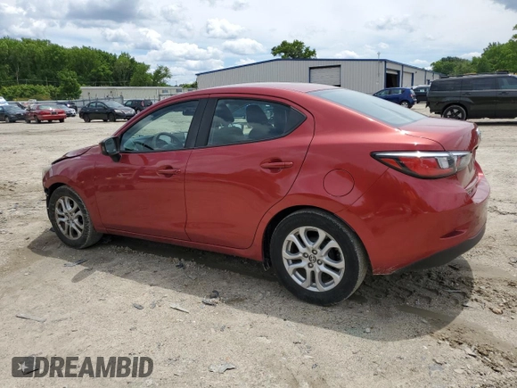 2016 Scion iA z VIN 3MYDLBZV6GY129364, wystawiony jako Copart lot #57217905 z przebiegiem 139 110 mil mil oraz Tytuł czysty. Historia ofert i sprzedaży dostępna na DreamBid. Obrazek 3.
