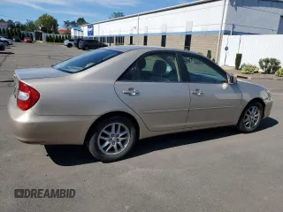 2004 Toyota Camry LE with VIN 4T1BE32K84U929163, listed as a Copart auction lot 65193485 with 245,734 mi miles and Clean title. Bid and sale history available at DreamBid. Image 3.
