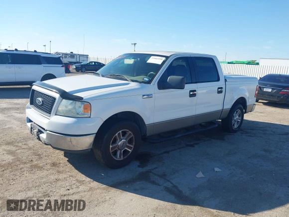 2005 Ford F-150 XLT with VIN 1FTPW12585FA54825, listed as a IAAI auction lot 41662210 with 288,819 mi miles. Bid and sale history available at carsss.com. Image 14.