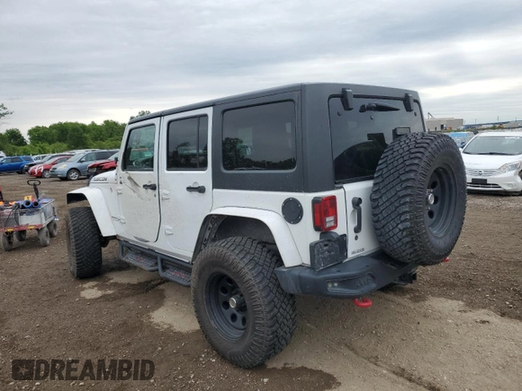 2016 Jeep Wrangler Unlimited Rubicon with VIN 1C4HJWFG9GL223928, listed as a Copart auction lot 58182125 with 57,711 mi miles and Salvage title. Bid and sale history available at DreamBid. Image 2.