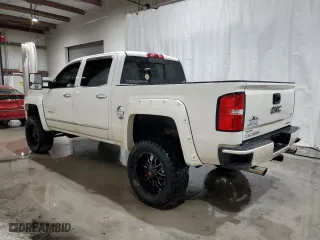 2015 GMC Sierra 1500 Denali with VIN 3GTU2WEJ3FG338044, listed as a Copart auction lot 50774205 with 111,691 mi miles and Salvage Title. Bid and sale history available at carsss.com. Image 2.
