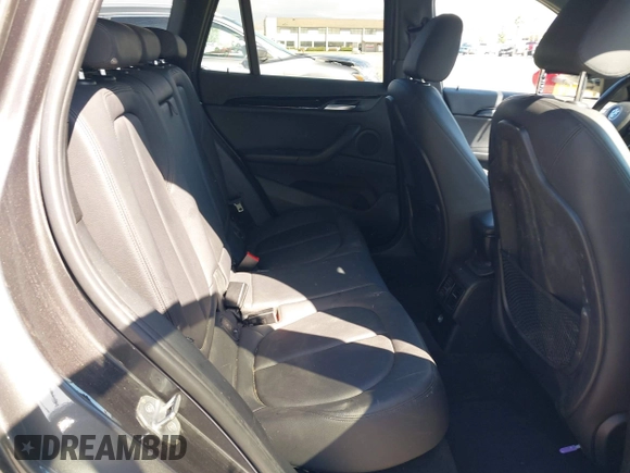 2018 BMW X1 sDrive28i with VIN WBXHU7C36J5L05628, listed as a IAAI auction lot 41708522 with 91,352 mi miles and . Bid and sale history available at DreamBid. Image 8.