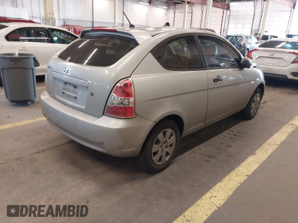 2008 Hyundai Accent GS with VIN KMHCM36C78U066341, listed as a IAAI auction lot 41377961 with 354,357 mi miles. Bid and sale history available at carsss.com. Image 4.
