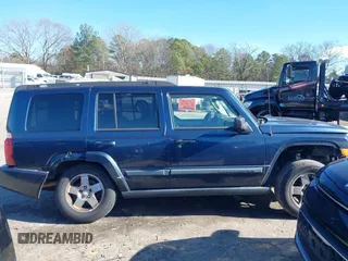 2009 Jeep Commander Sport with VIN 1J8HH48K29C530970, listed as a IAAI auction lot 41232353 with 280,000 mi miles and . Bid and sale history available at DreamBid. Image 14.