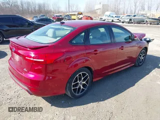 2015 Ford Focus SE with VIN 1FADP3F25FL273973, listed as a IAAI auction lot 41801026 with 138,482 mi miles. Bid and sale history available at carsss.com. Image 4.