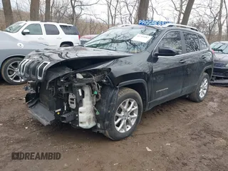 2016 Jeep Cherokee 75th Anniversary with VIN 1C4PJMCB7GW163641, listed as a IAAI auction lot 41743483 with 155,402 mi miles. Bid and sale history available at carsss.com. Image 2.