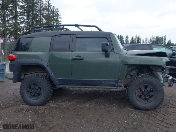2011 Toyota FJ Cruiser with VIN JTEBU4BF5BK108168, listed as a IAAI auction lot 41829688 with 163,354 mi miles. Bid and sale history available at carsss.com. Image 14.