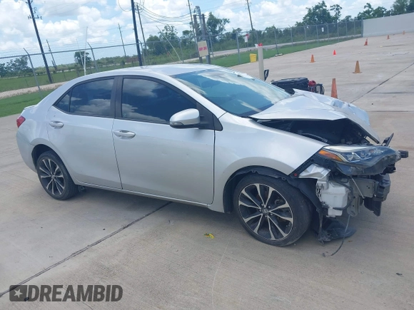 2017 Toyota Corolla L z VIN 5YFBURHE4HP732912, wystawiony jako IAAI lot #42451597 z przebiegiem 73 901 mil mil oraz . Historia ofert i sprzedaży dostępna na DreamBid. Obrazek 13.