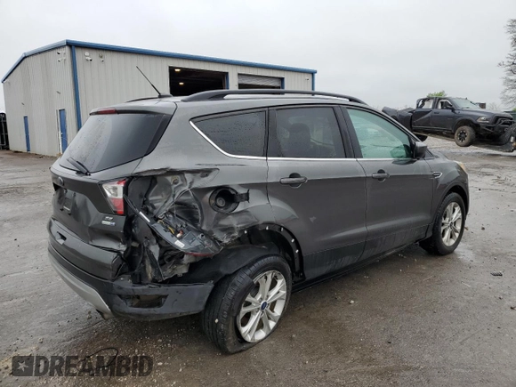 2018 Ford Escape SE with VIN 1FMCU9GD2JUA48491, listed as a Copart auction lot 51832565 with 207,422 mi miles and Salvage Title. Bid and sale history available at carsss.com. Image 3.