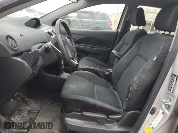2012 Toyota Yaris with VIN JTDBT4K35CL037319, listed as a Copart auction lot 46098585 with 126,039 mi miles and Salvage Title. Bid and sale history available at DreamBid. Image 7.