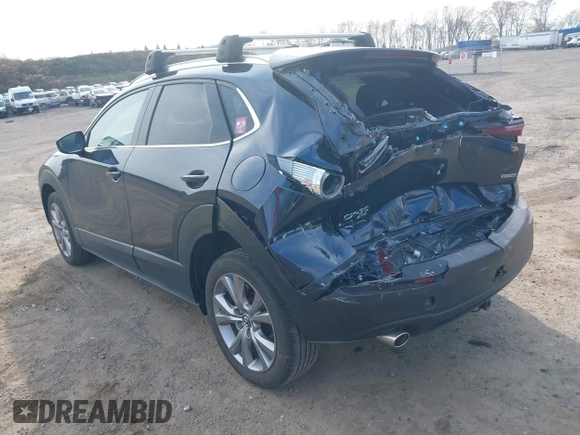 2021 Mazda CX-30 Premium with VIN 3MVDMBDM4MM238367, listed as a IAAI auction lot 42124335 with 31,120 mi miles and . Bid and sale history available at DreamBid. Image 3.