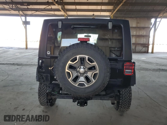 2015 Jeep Wrangler Unlimited Rubicon Hard Rock with VIN 1C4HJWFG1FL532288, listed as a Copart auction lot 62262545 with 91,807 mi miles and Salvage title. Bid and sale history available at DreamBid. Image 6.