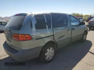 2000 Toyota Sienna CE with VIN 4T3GF19C9YU272554, listed as a Copart auction lot 73125134 with 240,998 mi miles and Salvage Title. Bid and sale history available at carsss.com. Image 3.