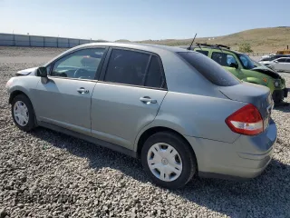 2010 Nissan Versa S with VIN 3N1BC1AP8AL457552, listed as a Copart auction lot 59703695 with 149,160 mi miles and Salvage title. Bid and sale history available at DreamBid. Image 2.