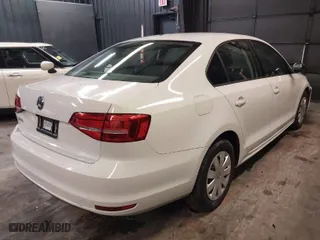 2015 Volkswagen Jetta Sedan 2.0L S with VIN 3VW2K7AJ5FM287843, listed as a IAAI auction lot 41273524 with 94,558 mi miles. Bid and sale history available at carsss.com. Image 4.