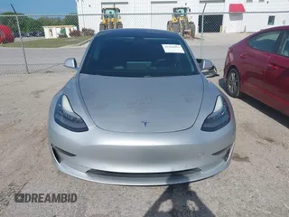 2018 Tesla Model 3 Long Range Battery with VIN 5YJ3E1EB7JF104356, listed as a IAAI auction lot 41936961 with 90,932 mi miles and . Bid and sale history available at DreamBid. Image 13.