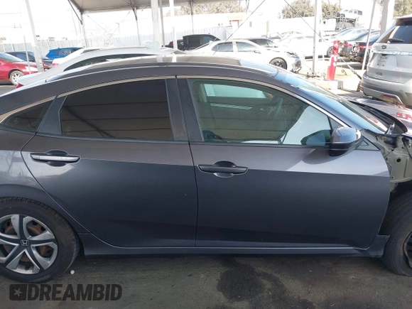 2017 Honda Civic LX z VIN 2HGFC2F53HH538362, wystawiony jako IAAI lot #42095715 z przebiegiem 156 799 mil mil oraz . Historia ofert i sprzedaży dostępna na DreamBid. Obrazek 14.