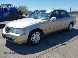 2000 Acura RL with VIN JH4KA9656YC001269, listed as a IAAI auction lot 41831469 with 158,504 mi miles. Bid and sale history available at carsss.com. Image 18.