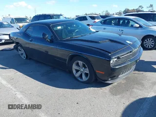 2017 Dodge Challenger SXT z VIN 2C3CDZAG7HH594650, wystawiony jako IAAI lot #41795696 z przebiegiem 170 967 mil mil oraz . Historia ofert i sprzedaży dostępna na DreamBid. Obrazek 1.