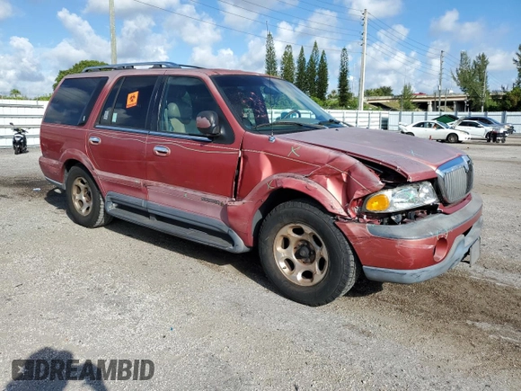 1999 Lincoln Navigator z VIN 5LMRU27A2XLJ41370, wystawiony jako Copart lot #72879004 z przebiegiem Nie podano mil oraz Szkoda całkowita • Salvage title. Historia ofert i sprzedaży dostępna na DreamBid. Obrazek 4.