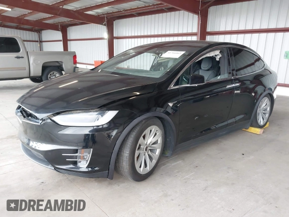 2017 Tesla Model X 90D z VIN 5YJXCAE21HF041207, wystawiony jako IAAI lot #41766065 z przebiegiem Nie podano mil oraz . Historia ofert i sprzedaży dostępna na DreamBid. Obrazek 19.
