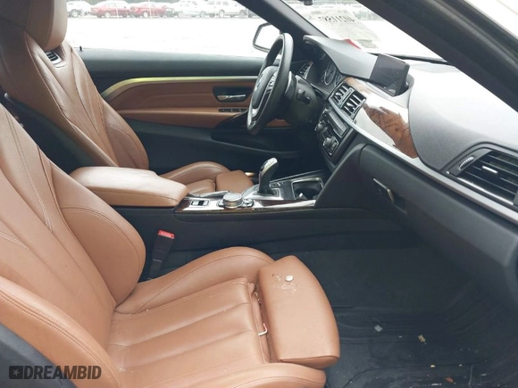 2016 BMW 4 Series 428i xDrive with VIN WBA3T1C58GP822626, listed as a IAAI auction lot 40211587 with 82,285 mi miles. Bid and sale history available at carsss.com. Image 5.