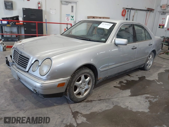 1999 Mercedes-Benz E-Class with VIN WDBJF82HXXX022432, listed as a IAAI auction lot 41793493 with 1 mi miles. Bid and sale history available at carsss.com. Image 2.