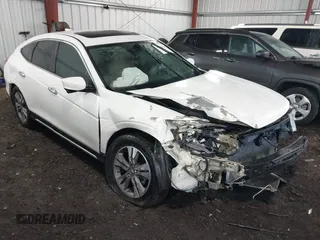 2013 Honda Crosstour EX-L z VIN 5J6TF1H54DL000177, wystawiony jako IAAI lot #41330939 z przebiegiem 140 860 mil mil oraz . Historia ofert i sprzedaży dostępna na DreamBid. Obrazek 1.