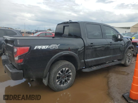 2024 Nissan Titan Pro-4X with VIN 1N6AA1ED7RN106896, listed as a Copart auction lot 55622215 with 16,155 mi miles and Salvage title. Bid and sale history available at DreamBid. Image 3.