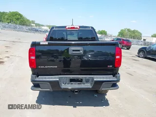 2021 Chevrolet Colorado 2WD LT z VIN 1GCGSCEN1M1221153, wystawiony jako IAAI lot #42056068 z przebiegiem 79 310 mil mil oraz . Historia ofert i sprzedaży dostępna na DreamBid. Obrazek 16.