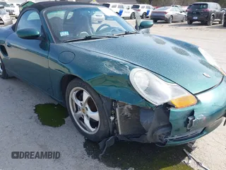 2001 Porsche Boxster z VIN WP0CA29831U623833, wystawiony jako IAAI lot #42075731 z przebiegiem 69 922 mil mil oraz . Historia ofert i sprzedaży dostępna na DreamBid. Obrazek 6.