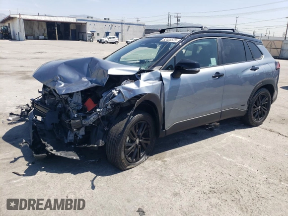 2024 Toyota Corolla Cross Hybrid S z VIN 7MUFBABG8RV049743, wystawiony jako Copart lot #52405635 z przebiegiem 14 426 mil mil oraz Szkoda całkowita • Salvage title. Historia ofert i sprzedaży dostępna na DreamBid. Obrazek 1.