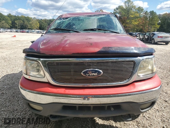 1999 Ford F-150 с VIN 1FTRF18W7XNB96181, выставлен на аукционе Copart как лот 76442364 с пробегом 143 813 миль миль и Списание • Salvage title. История ставок и продаж доступна на DreamBid. Изображение 5.