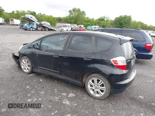 2009 Honda Fit Sport with VIN JHMGE88469S055316, listed as a IAAI auction lot 42306333 with 144,377 mi miles and . Bid and sale history available at DreamBid. Image 3.