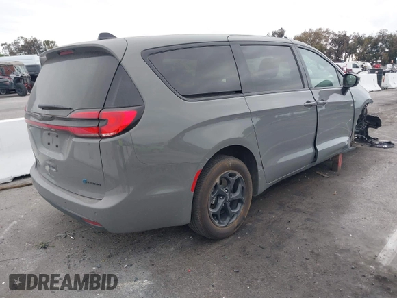 2023 Chrysler Pacifica Hybrid Touring L with VIN 2C4RC1L71PR584485, listed as a IAAI auction lot 42056423 with 58,955 mi miles and . Bid and sale history available at DreamBid. Image 4.