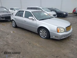 2002 Cadillac DeVille DTS with VIN 1G6KF57992U220129, listed as a IAAI auction lot 41426014 with 1 mi miles. Bid and sale history available at carsss.com. Image 1.