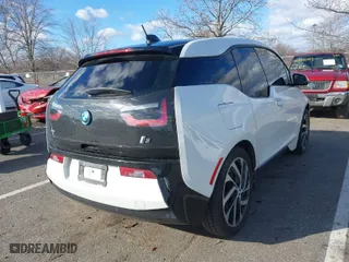2014 BMW i3 with VIN WBY1Z4C5XEV276199, listed as a IAAI auction lot 41229581 with NaN miles. Bid and sale history available at carsss.com. Image 4.