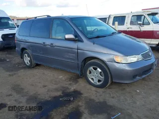 1999 Honda Odyssey EX z VIN 2HKRL186XXH541793, wystawiony jako IAAI lot #41708639 z przebiegiem 155 283 mil mil oraz . Historia ofert i sprzedaży dostępna na DreamBid. Obrazek 1.