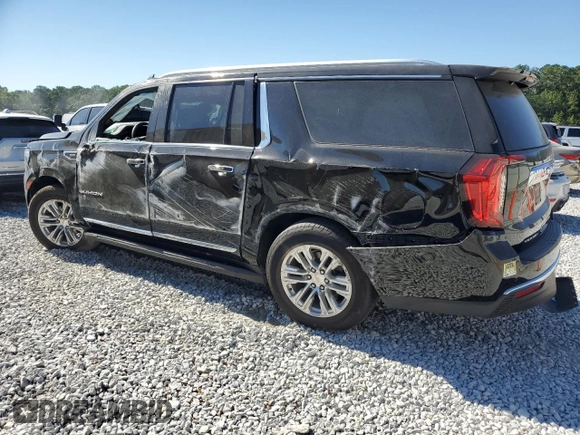2023 GMC Yukon XL SLT with VIN 1GKS2GKDXPR254627, listed as a Copart auction lot 59226594 with 39,428 mi miles and Salvage Title. Bid and sale history available at DreamBid. Image 2.