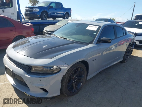 2020 Dodge Charger R/T with VIN 2C3CDXCT3LH221189, listed as a IAAI auction lot 39370947 with 33,416 mi miles and . Bid and sale history available at carsss.com. Image 2.