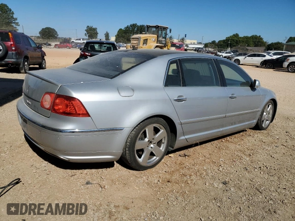 2004 Volkswagen Phaeton V8 z VIN WVWAF63D748010147, wystawiony jako Copart lot #75843654 z przebiegiem 147 157 mil mil oraz Nie do naprawy • Non repairable. Historia ofert i sprzedaży dostępna na DreamBid. Obrazek 3.