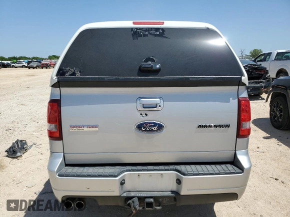2009 Ford Explorer Sport Trac with VIN 1FMEU23809UA12870, listed as a Copart auction lot 52614055 with 313,938 mi miles and Salvage title. Bid and sale history available at DreamBid. Image 6.