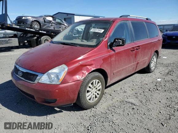 2012 Kia Sedona LX with VIN KNDMG4C74C6433769, listed as a Copart auction lot 69897564 with 161,793 mi miles and Salvage Title. Bid and sale history available at carsss.com. Image 1.