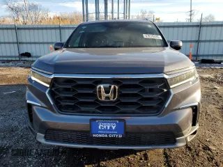 2025 Honda Pilot EX-L with VIN 5FNYG1H44SB063991, listed as a Copart auction lot 47678335 with 5 mi miles and Salvage title. Bid and sale history available at DreamBid. Image 5.